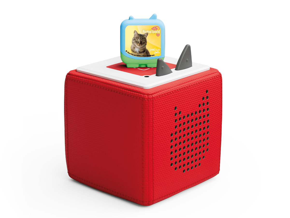 Full view of a Animal World Precious Pets Clever Tonies on a red Toniebox