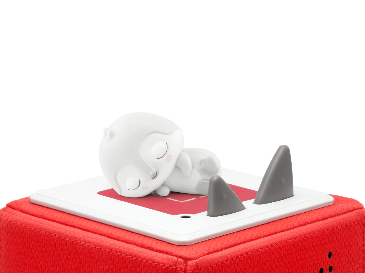 Sleepy Penguin: White Noise from the Ocean Tonie on a red Toniebox