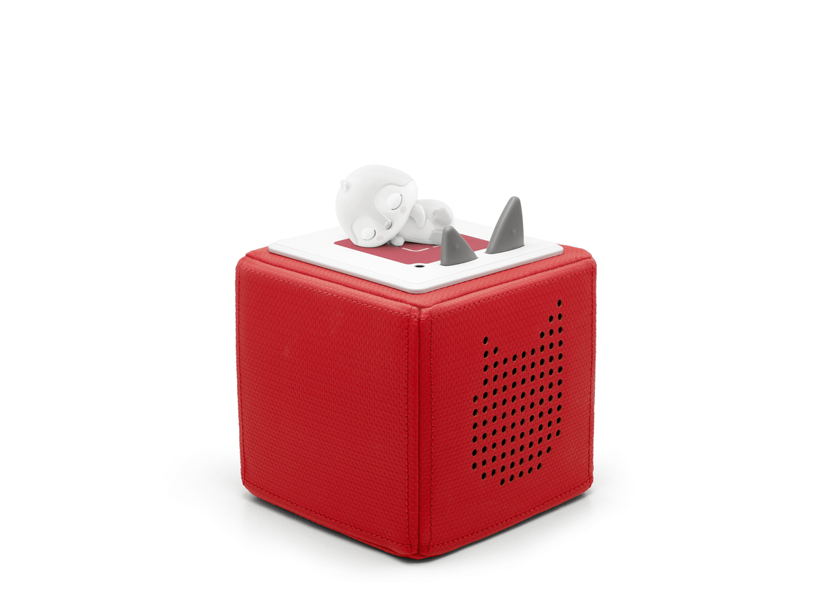 Full view of Sleepy Penguin: White Noise from the Ocean Tonie on a red toniebox