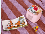 child playing with pink Toniebox 2, tonieplay controller, Winnie the Pooh tonie and disney tonieplay game